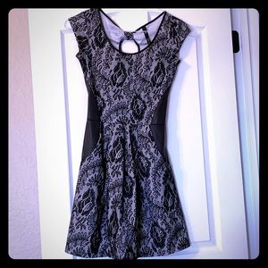 Lace & faux leather fit and flare with bow keyhole